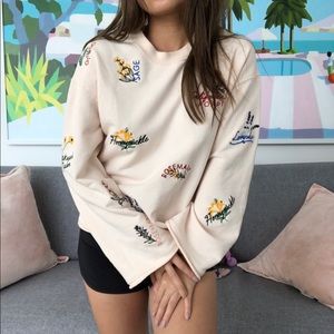 bell-sleeved sweatshirt